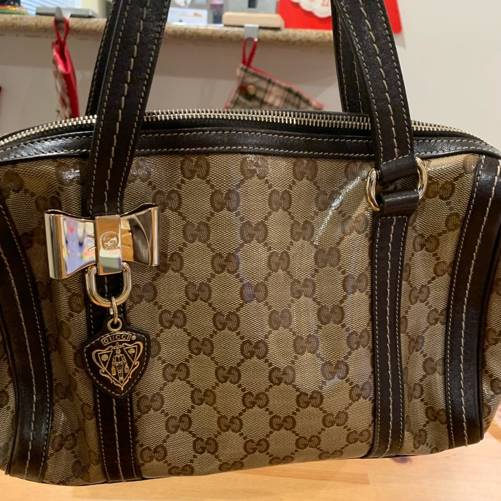Authentic Gucci gently used handbag with dust bag